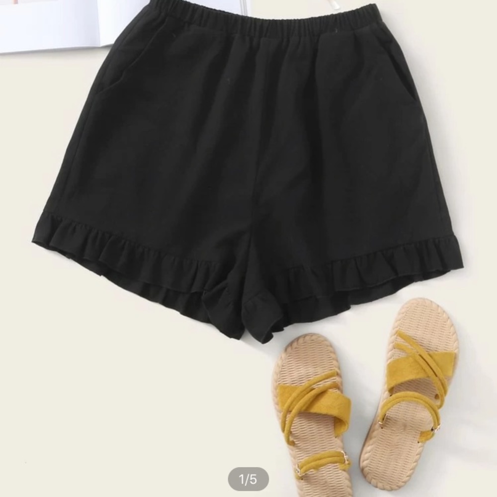 never worn black shorts